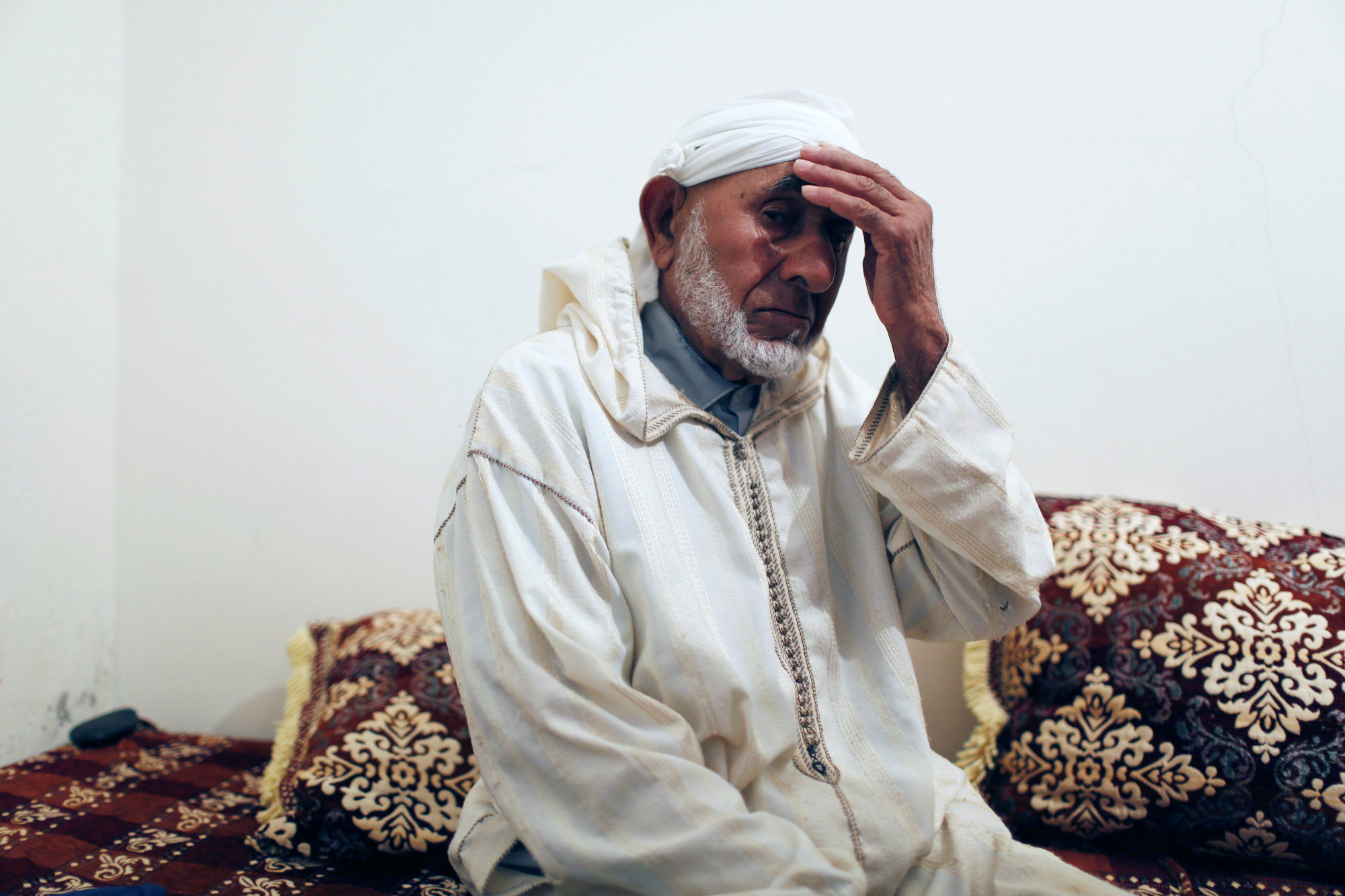 Moroccan suspect in Barcelona attack turned more conservative in past year: family