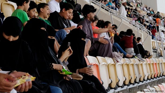 Women attend football match for first time ever in Saudi Arabia Women attend football match for first time ever in Saudi Arabia