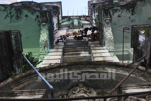 Clothes hanging from a typical façade in Yangon