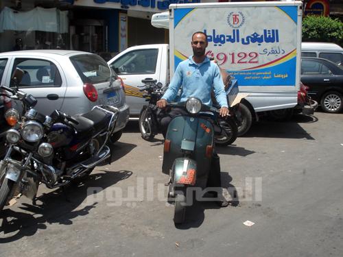 Shaban Mohamed on his scooter